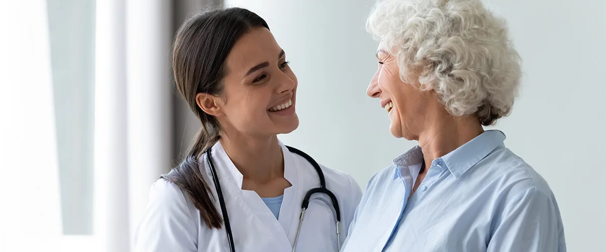 Viezec doctor reviewing a patient's case file during a stem cell therapy consultation